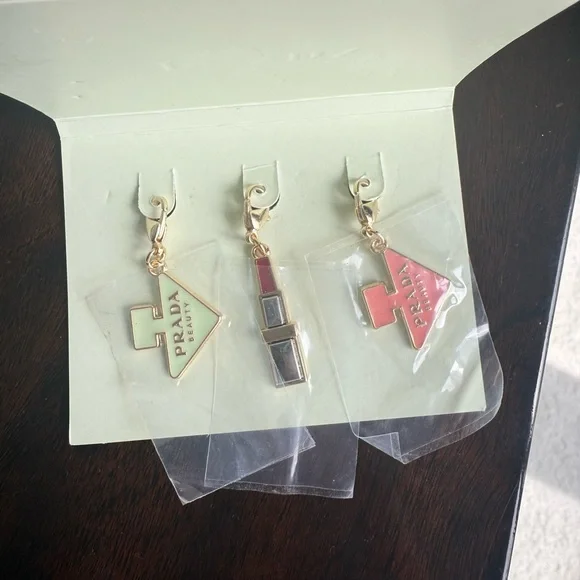 Prada Gold and Pink Charms - Picture 1 of 5